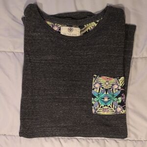 On the Byas Charcoal Tee with Vibrant Pocket